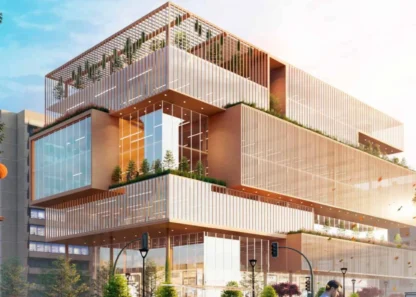 Modern architectural building with glass facade and greenery