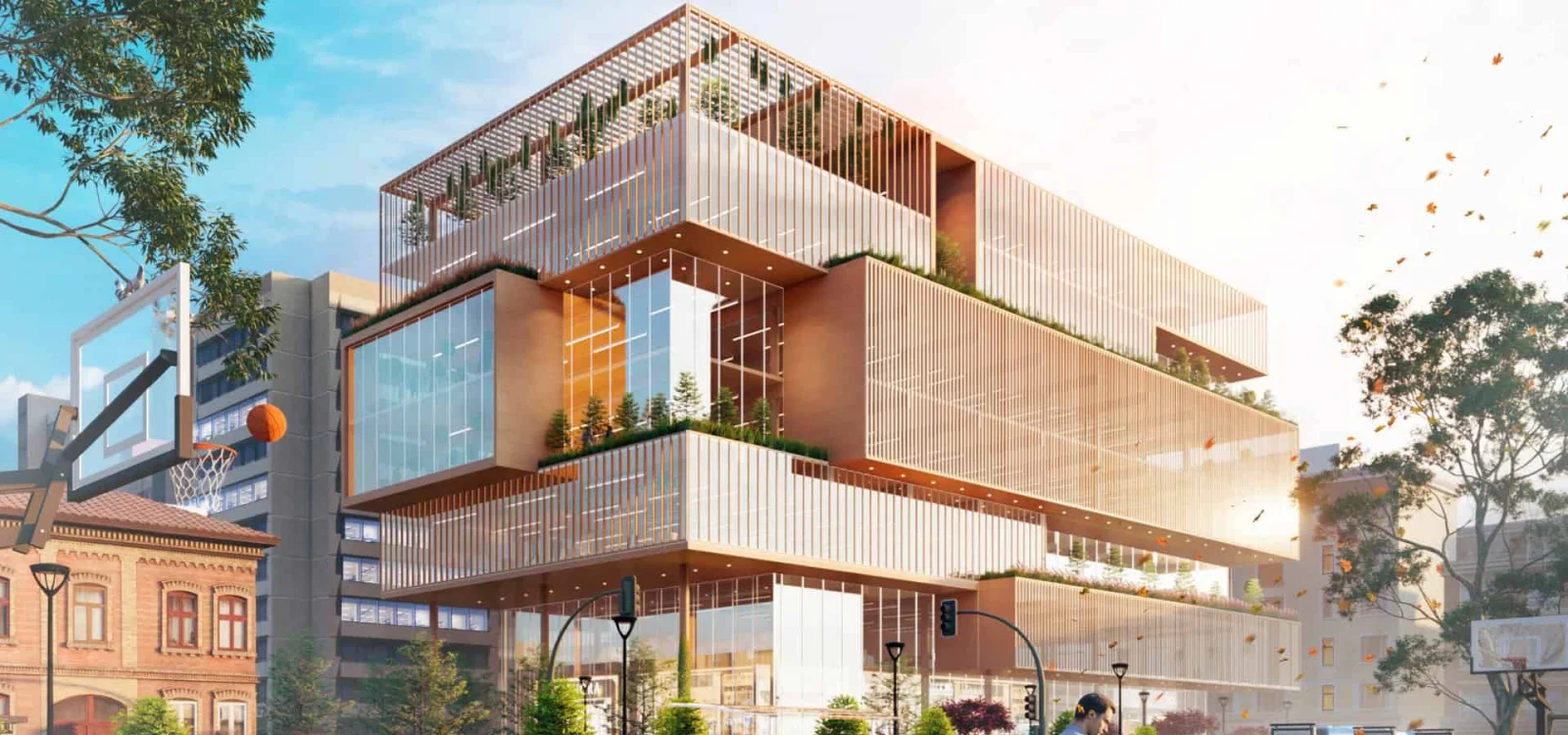 Modern architectural building with glass facade and greenery