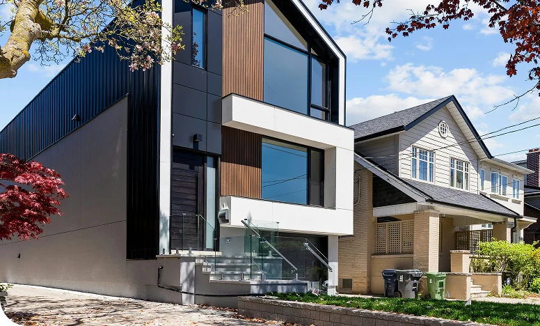 Modern urban house with large windows and sleek design