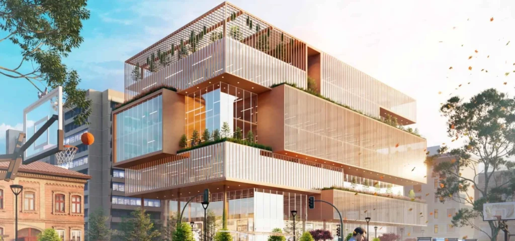 Modern multi-level building with glass and greenery